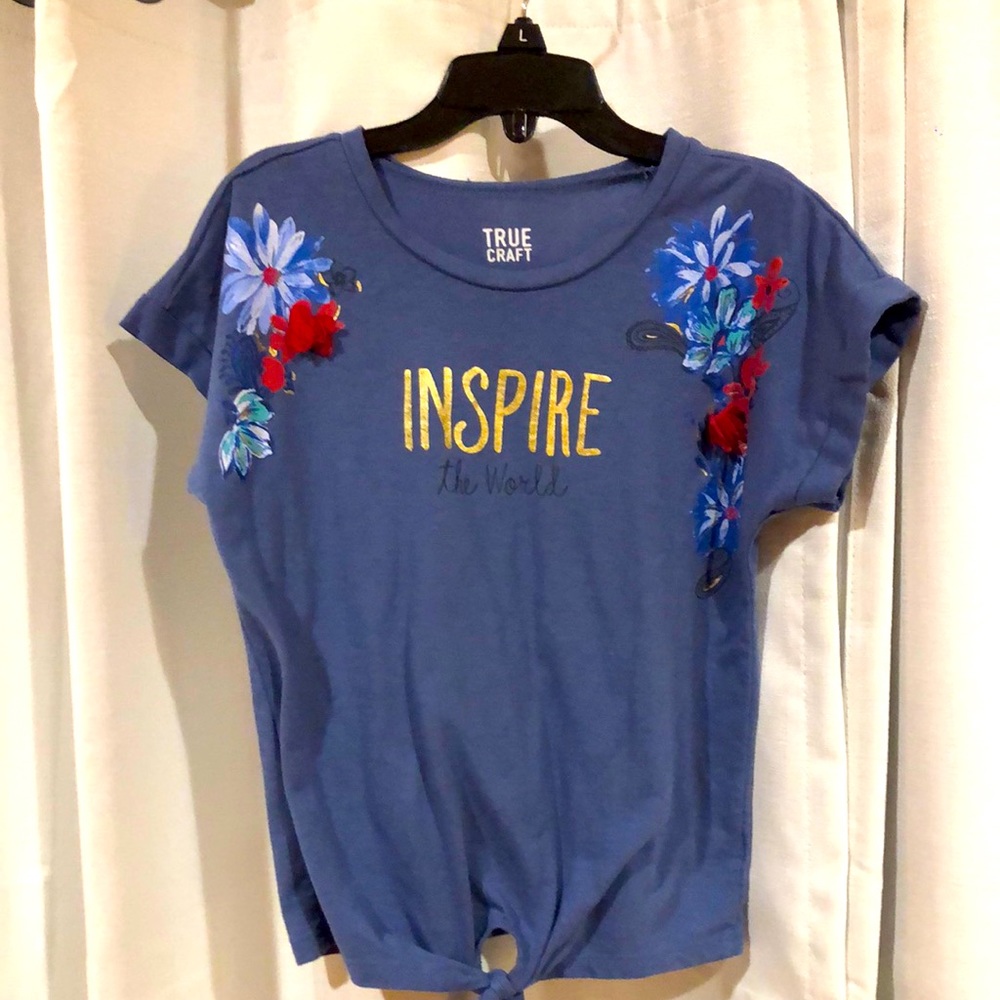 Shirt says inspire the world